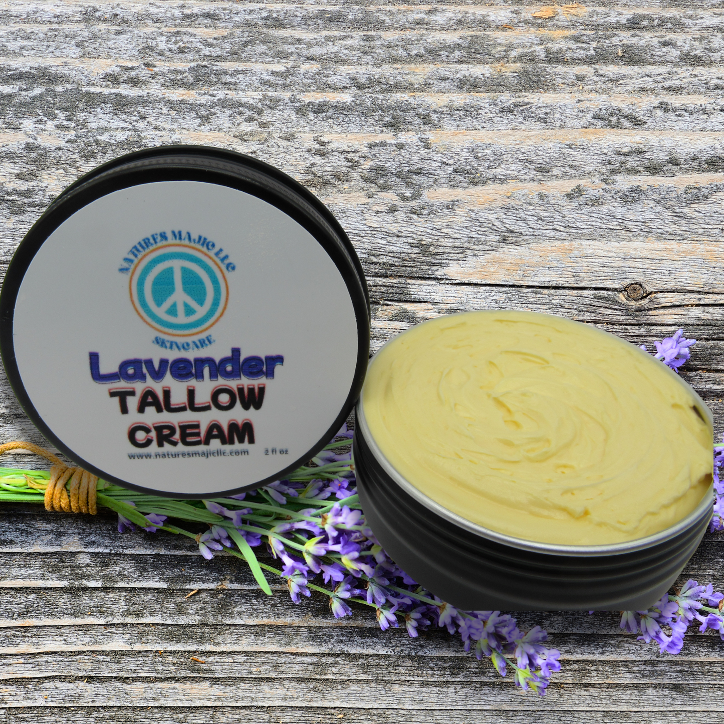 Lavender Tallow Cream in black container with cream and lavender sprigs on wooden surface for sensitive skin care
