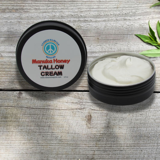 Tallow & Manuka Balm in black jar with creamy texture, natural skincare for hydration, healing, and sunburn relief on wooden background