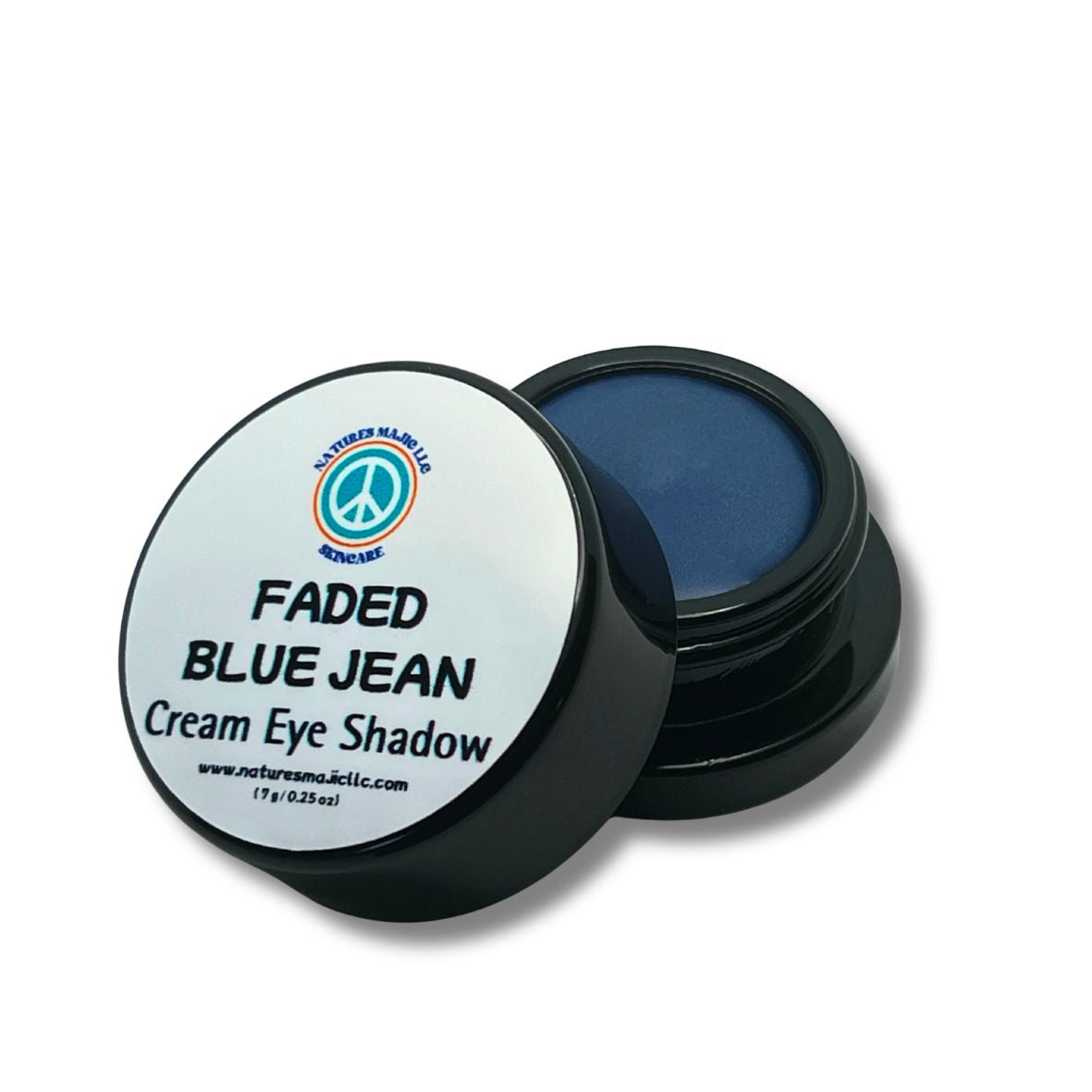 Creamy Faded Blue Jean eye shadow in black jar with soft denim-blue color and smooth finish