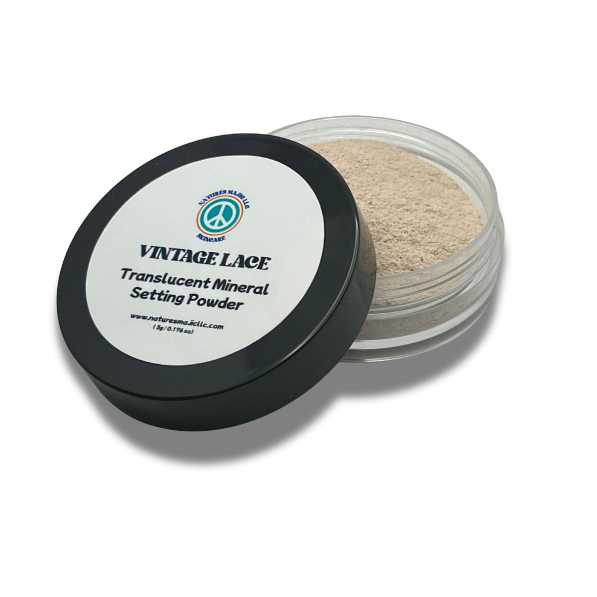 Vintage Lace translucent mineral setting powder in luxury jar with applicator against creasing and shine