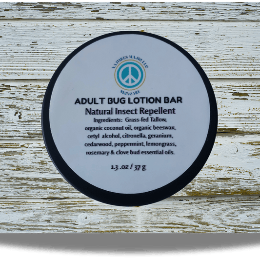 Adult Bug Lotion Bar herbal insect repellent on wooden background.