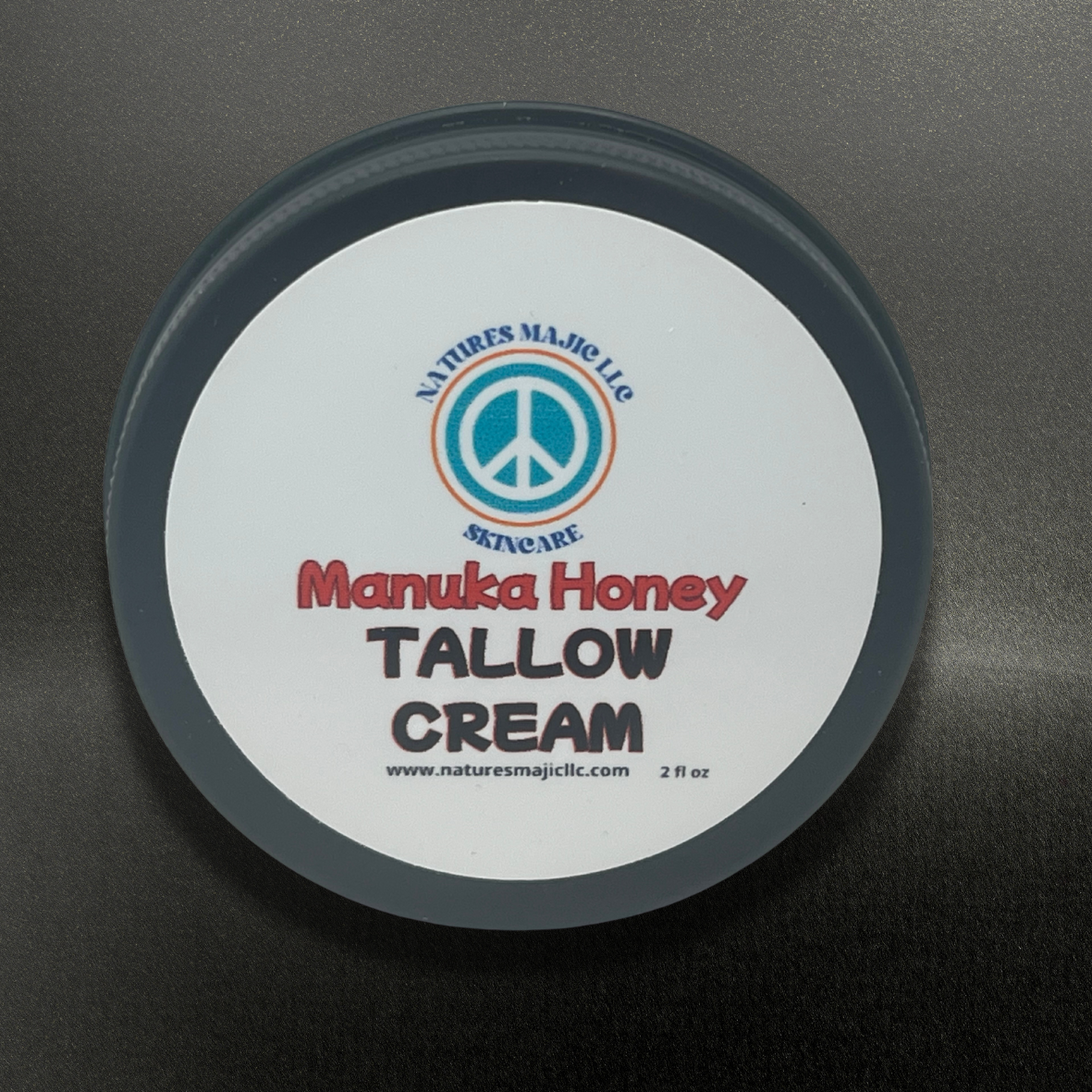 Tallow & Manuka Balm in black container for skin healing, hydration, and sunburn relief with raw Manuka honey and grass-fed tallow