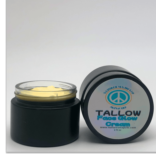 Tallow Face Glow whipped grass-fed tallow face cream in black jar with open lid showing creamy texture, natural nourishing skincare product