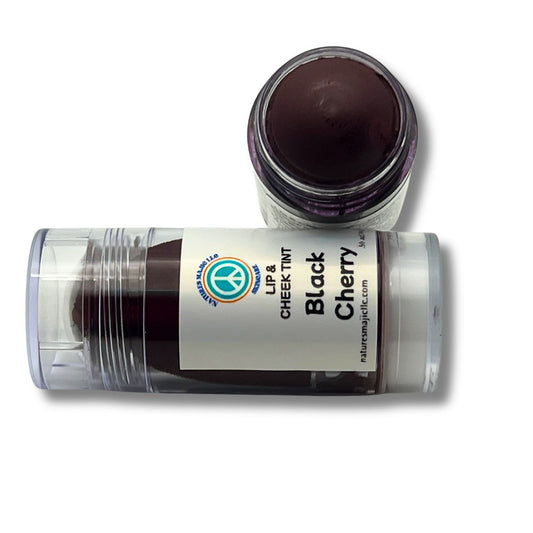 Lip+Cheek Tint Black Cherry in twist-up container with deep berry color and nourishing oils for lips and cheeks